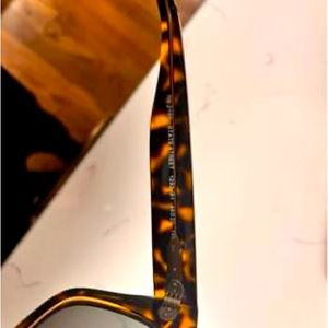 Ray Ban state street sunglasses.